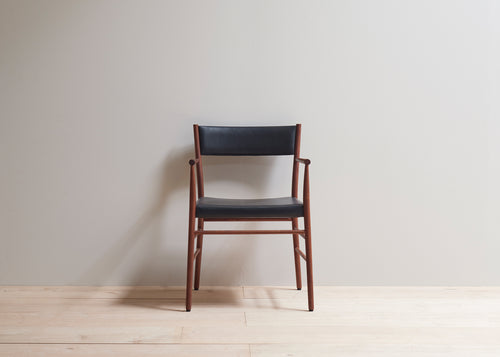 Avery armchair upholstered in walnut