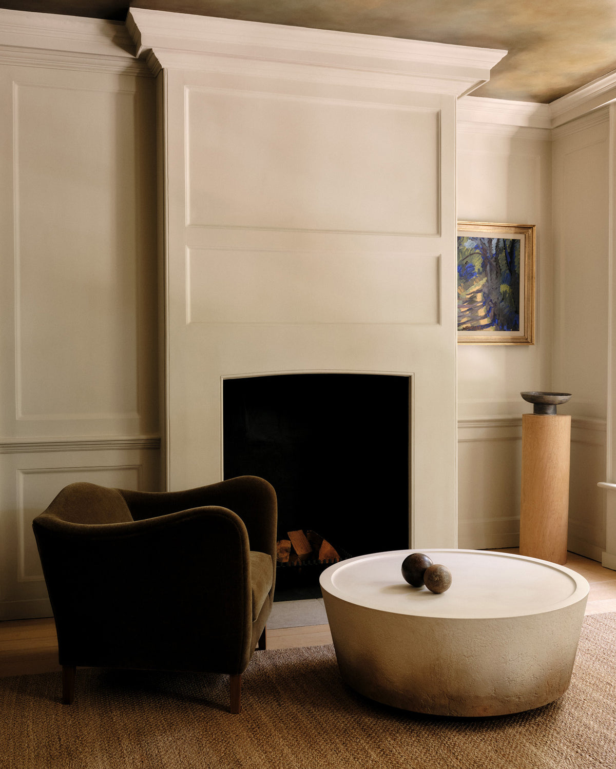 moreau-armchair-nim-dune-fireplace
