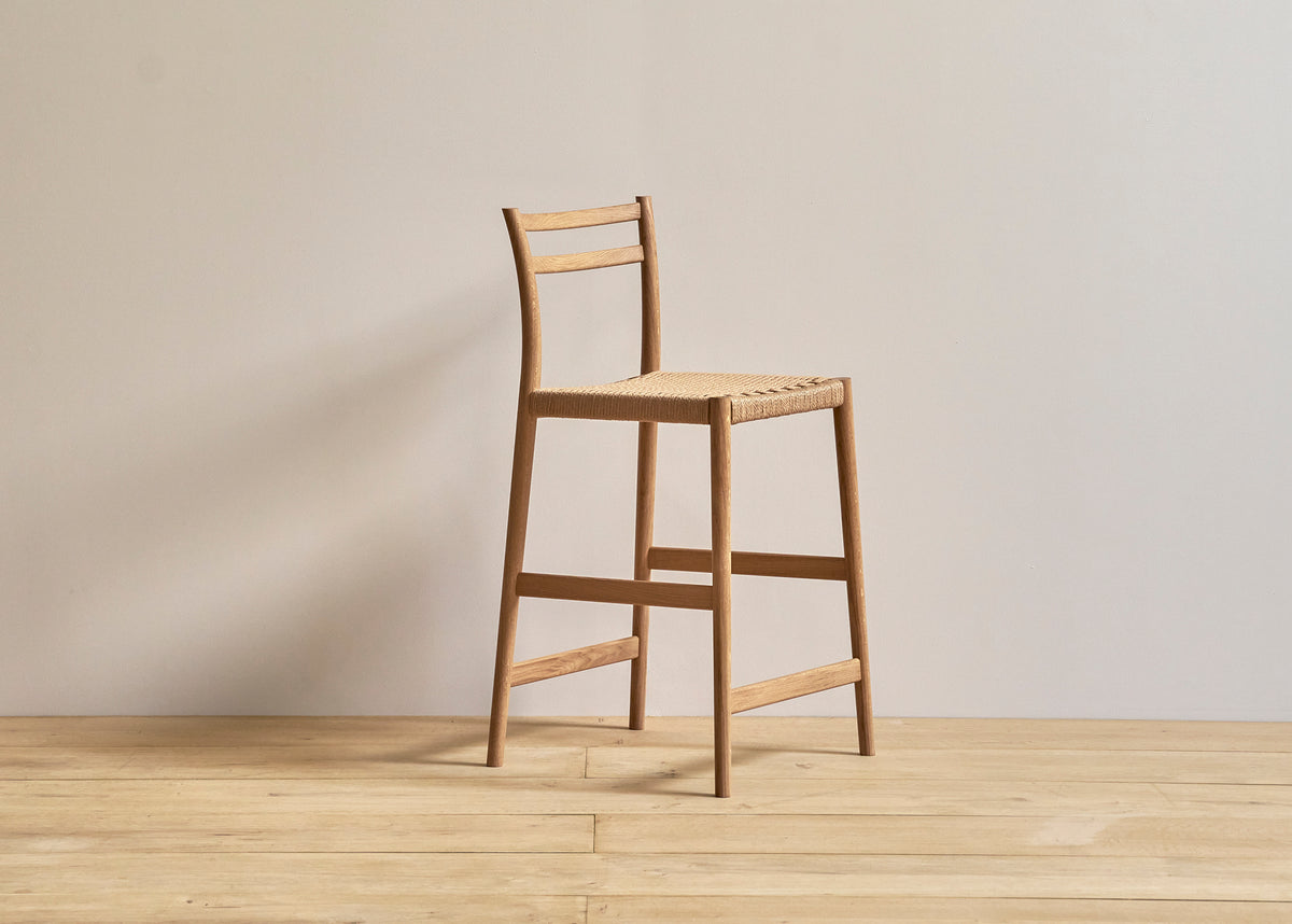 Avery woven counter stool