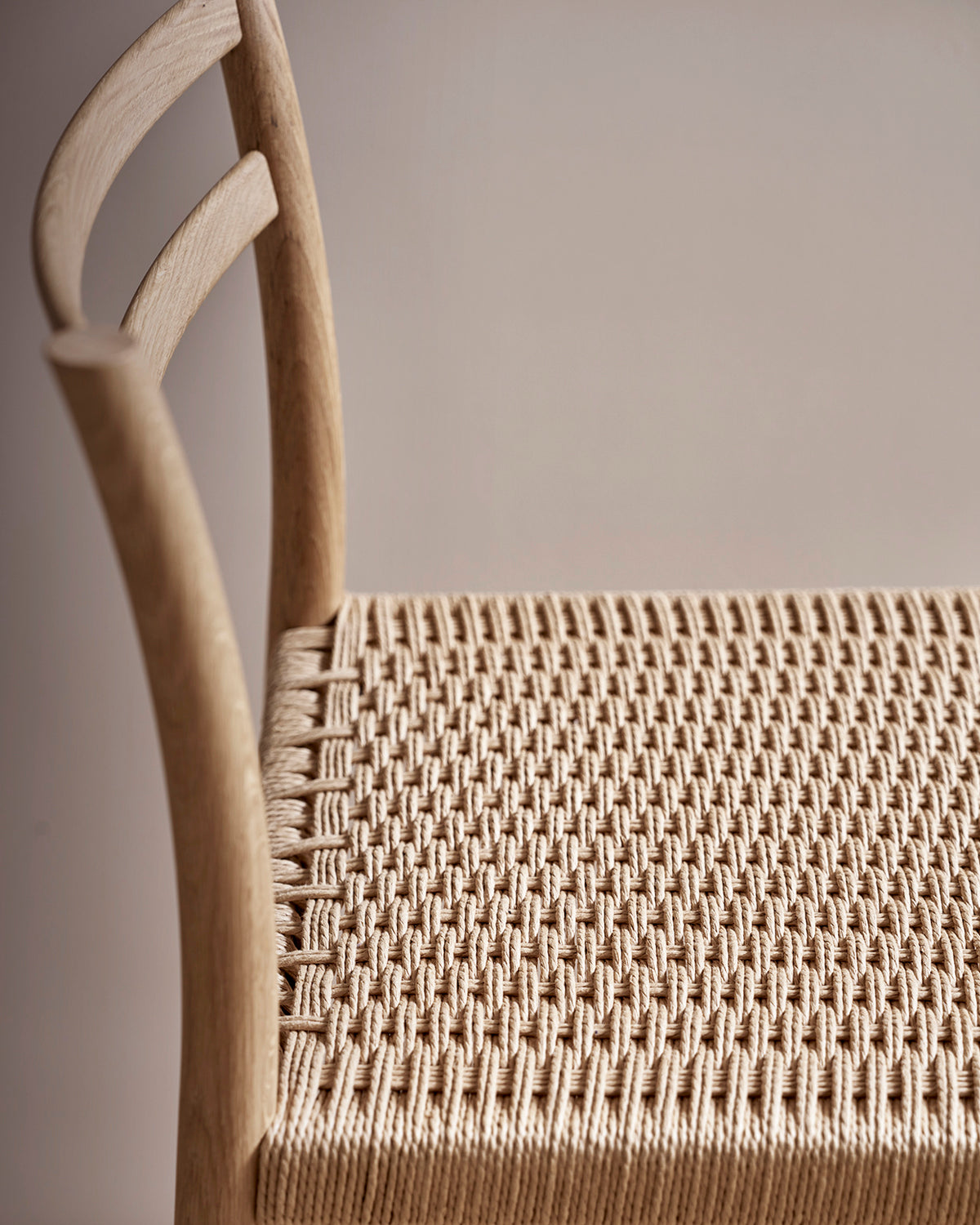 Avery woven counter stool