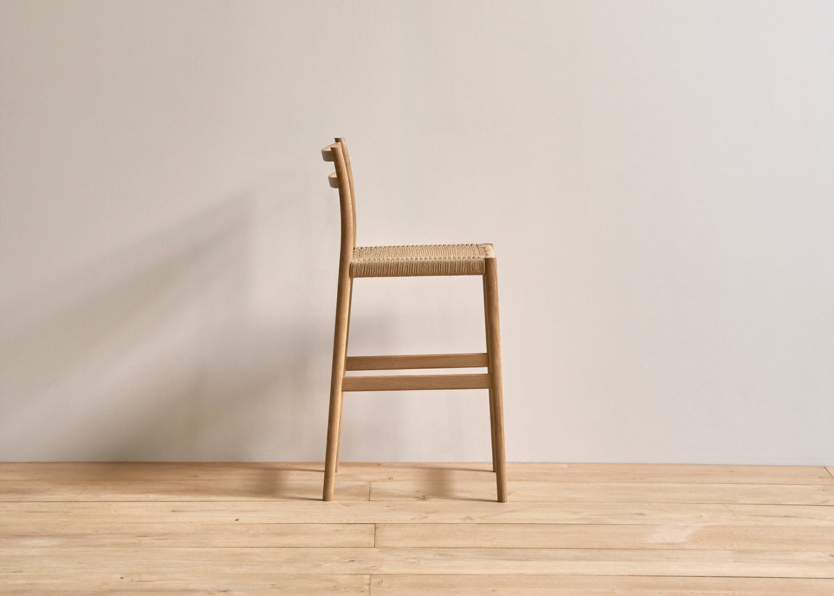 Avery woven counter stool